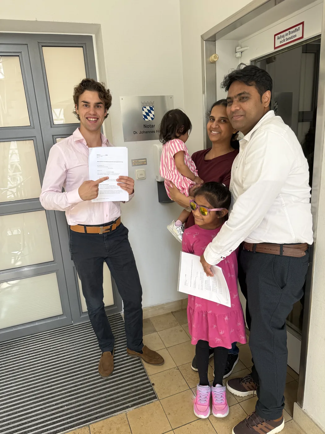 Clients signing at the notary